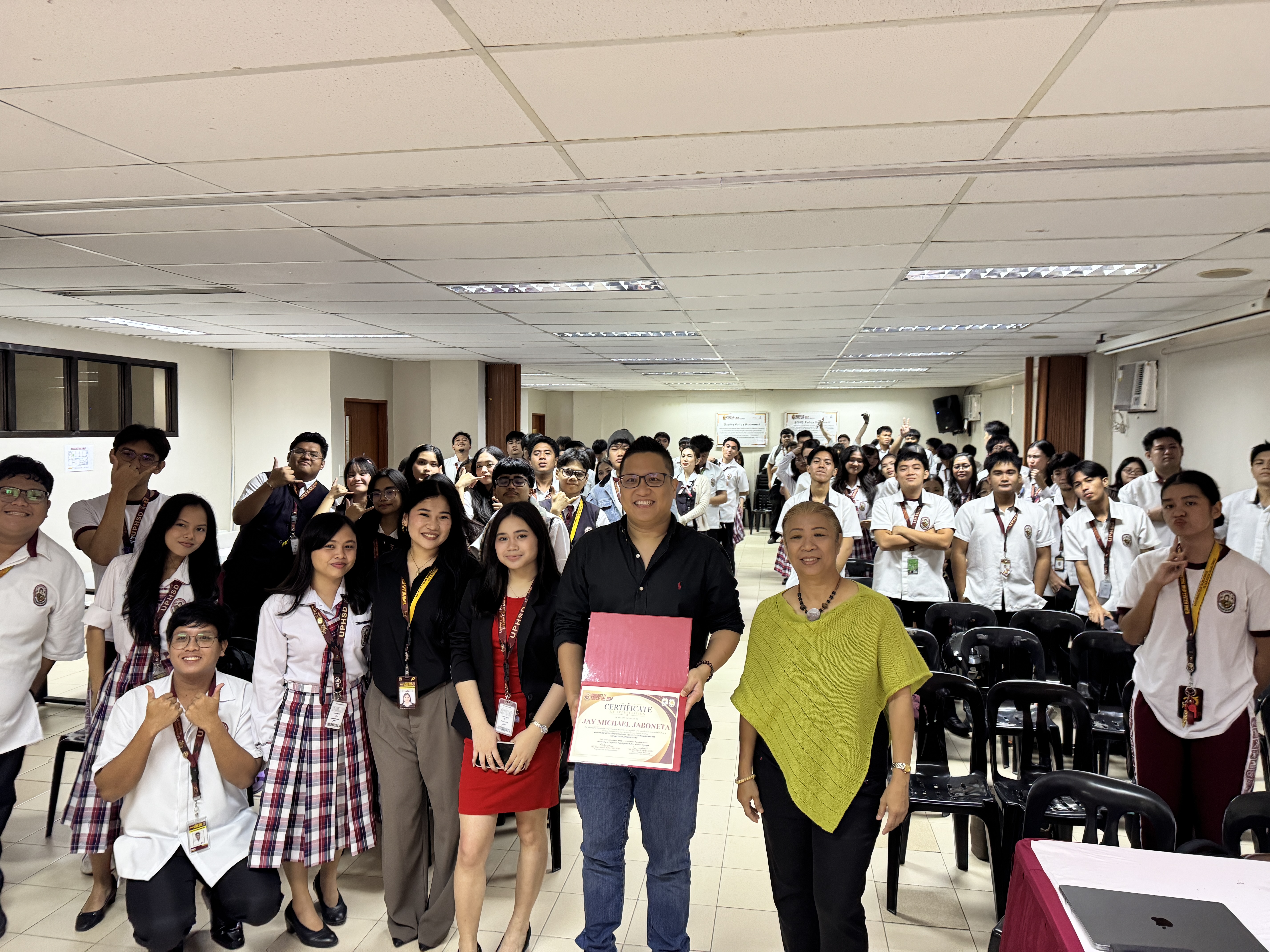 Jay Jaboneta with UPHSD Molino students and faculty after the AI video production workshop, Cavite, September 2026